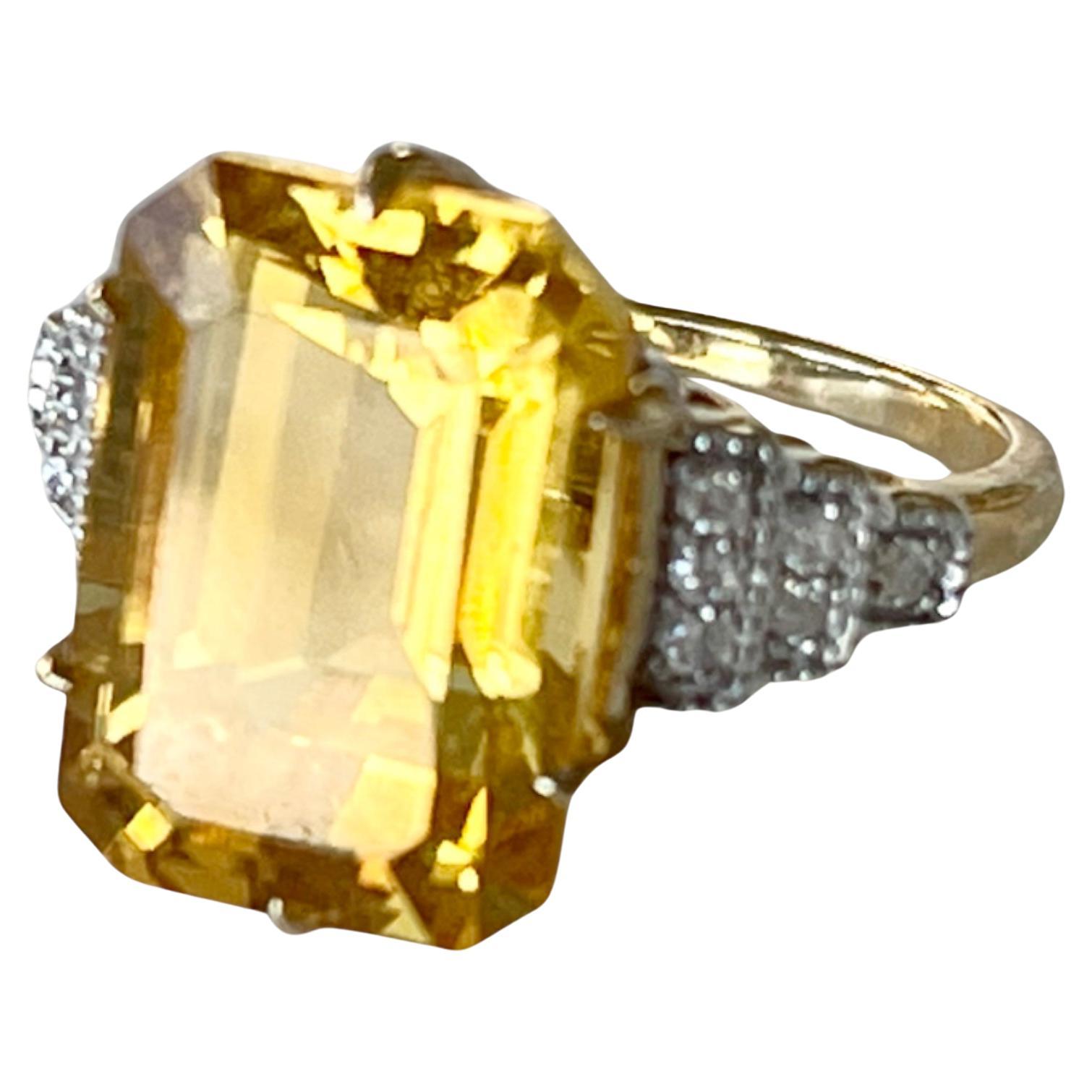 Presenting a Beautiful, Natural Citrine & Diamond Dress Ring.

The Citrine possesses a warm, golden colour that will brighten up any day!  It is emerald cut and weighs approximately 7.50 carats.  The gem is very clean with a lot of shine which made