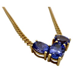 Necklace in 19.2 carat gold and 0.52 carat Tanzanite