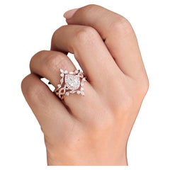 0.70 carat Pear Moissanite Halo Twist Shank Engagement Ring & Iceland Ring Guard