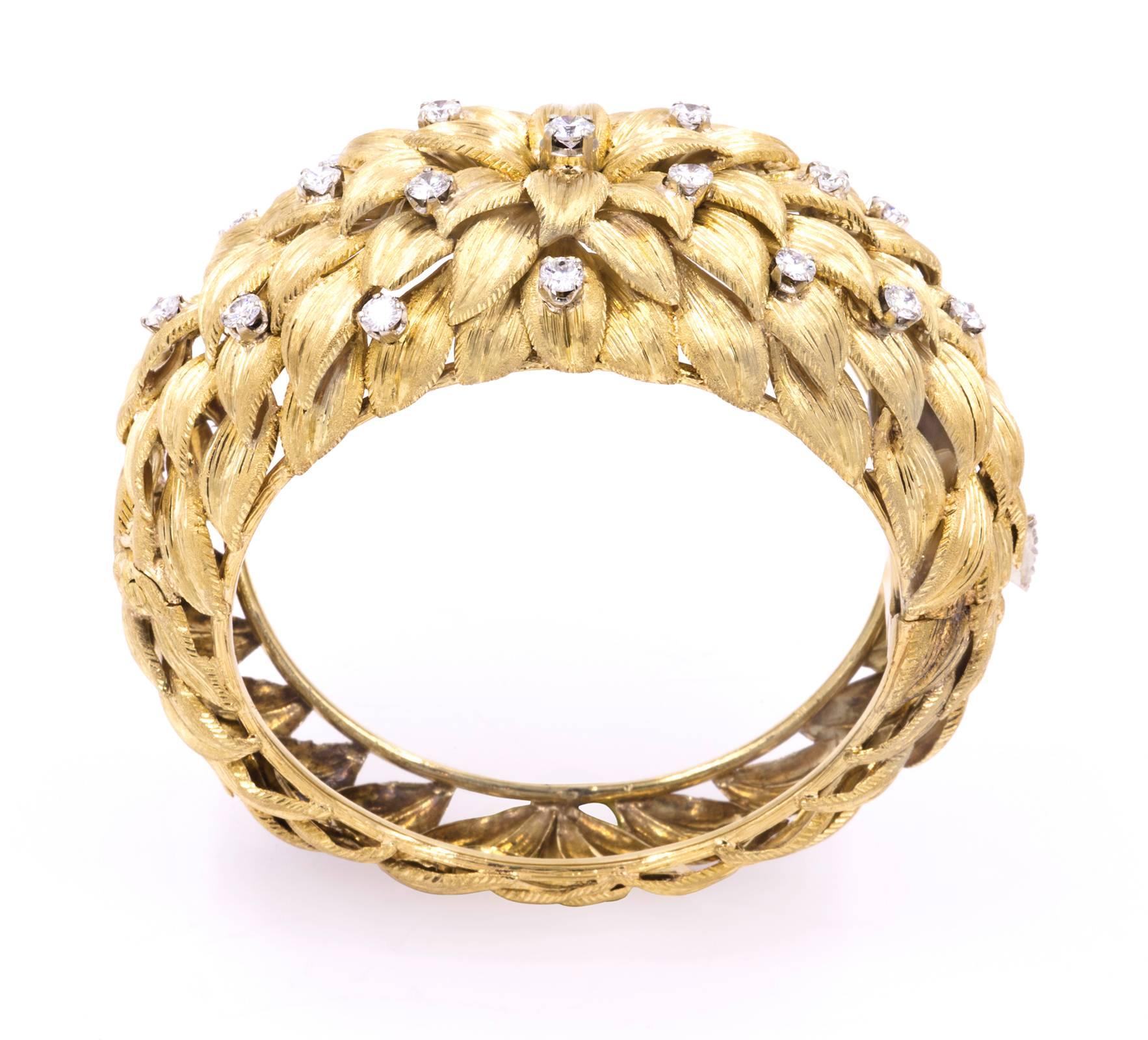 Large dramatic showstopper!  18k gold bracelet.  Hinge clip on, Decorative chrysanthemum petal design, sprinkled with 19 sparkling diamonds.  Total of 3.13ct of diamonds. VS1 color White. Total weight, 105.56 g.
