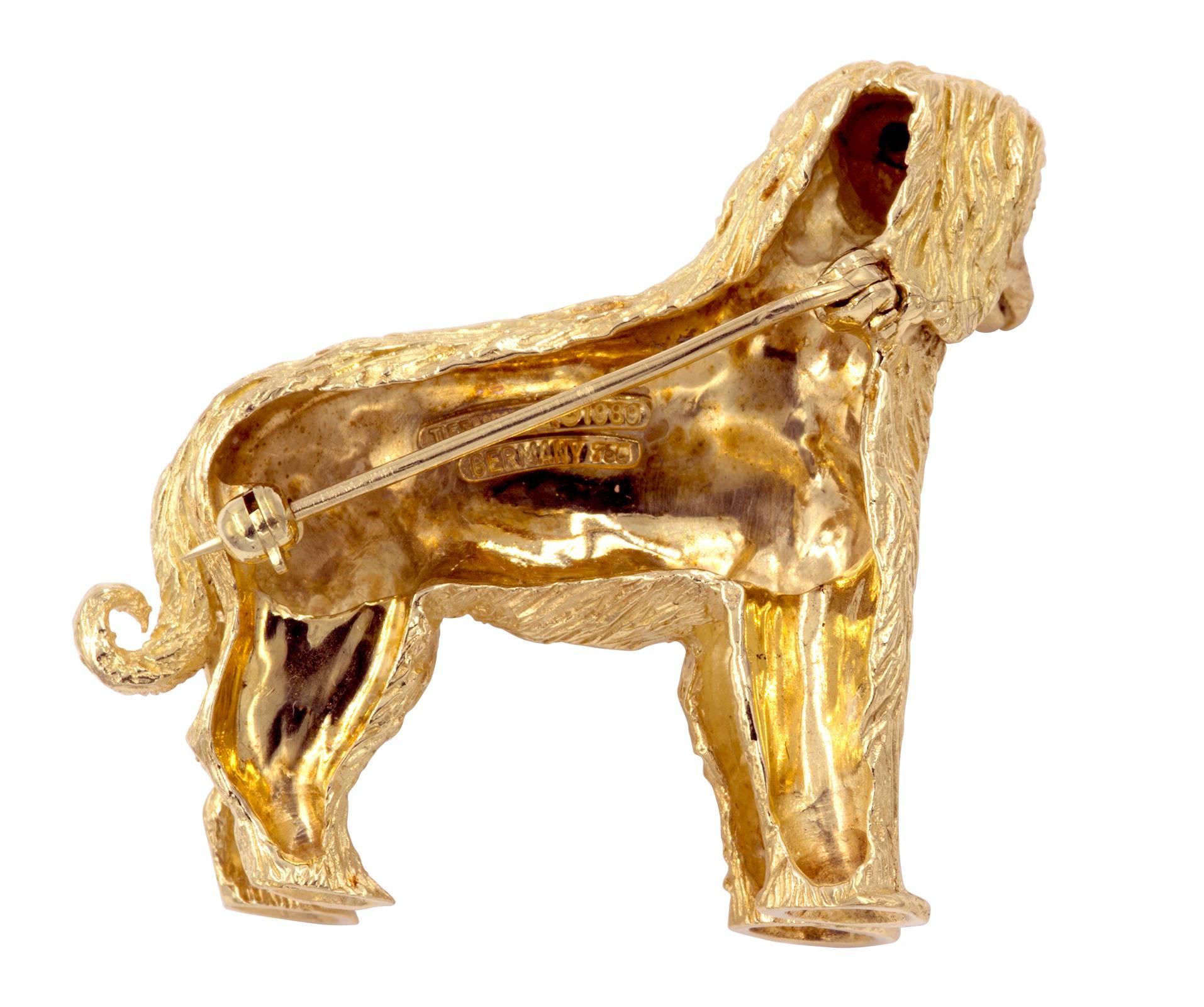 18k Yellow gold, Sweet face Shaggy Dog Brooch with sapphire eyes.  Marked Tiffany and Co. 750 Germany.  Total weight 24.24g