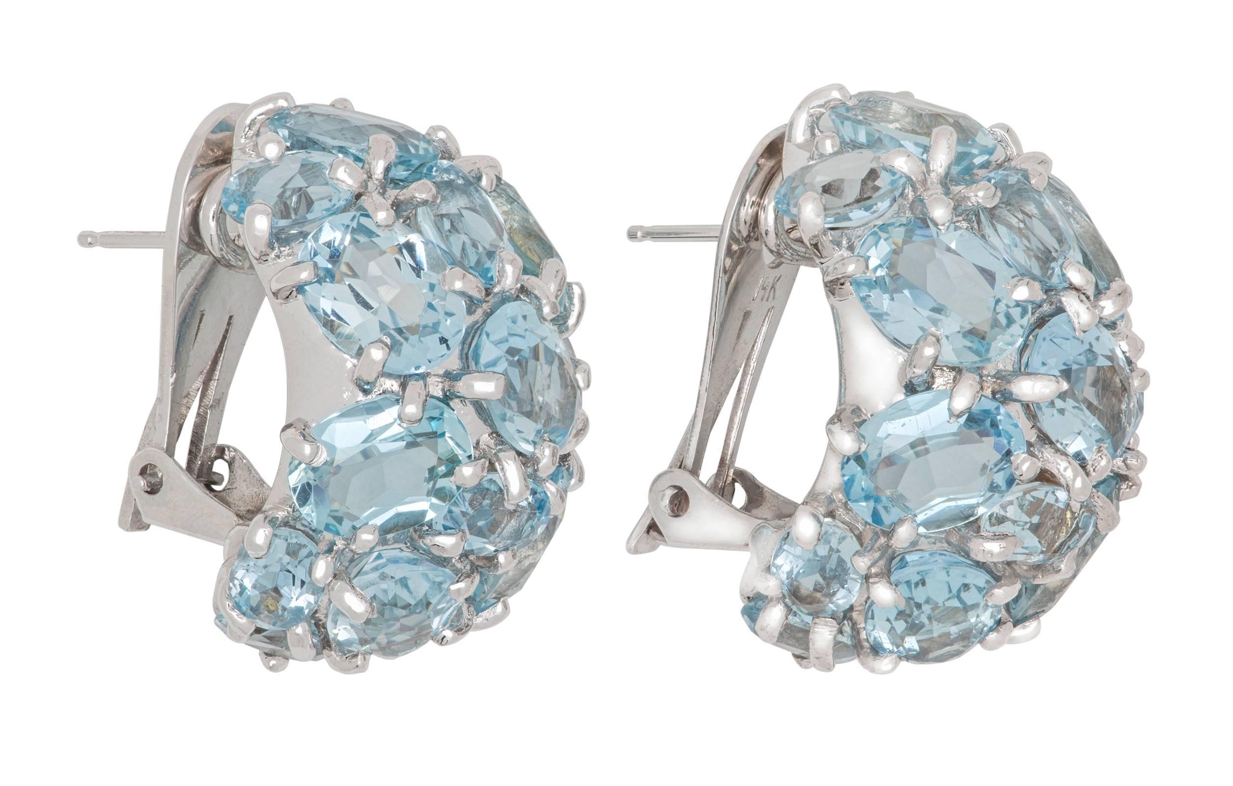 Fabulous dazzling dome shape Aquamarines 14k gold ear clips.
Sparkling blue enhanced by 14k gold Rodium plated.
Great size clips to adorn your face!  approximately 35ct  of aquamarine.
Size .75 X 1.0 X .5 d
Total weight 20.7g

