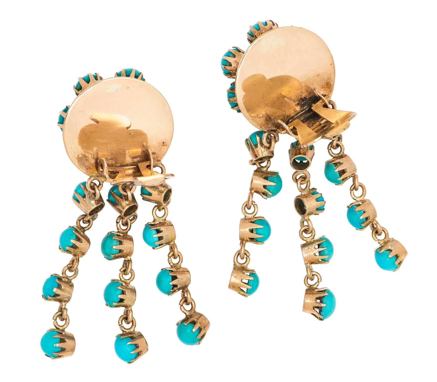Spectacular pair of Victorian era Persian Turquoise Tassel earrings.
Tested 14k yellow gold, Secure tight ear clip backs with peg for pierced ears. .75  X 2