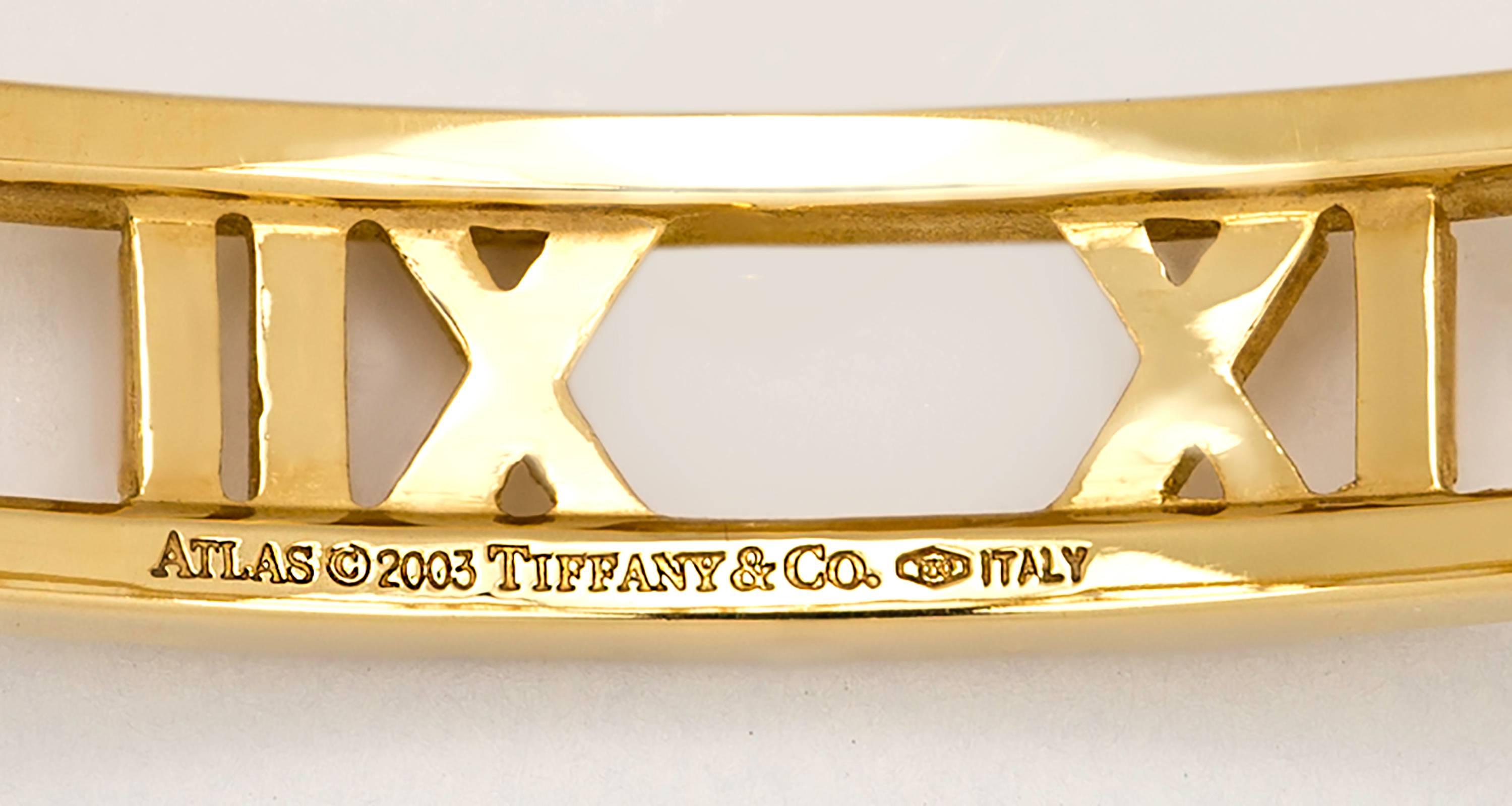 Lovely Tiffany and Co 18k yellow gold Atlas  bracelet.  Pierced  bangle style. Total weight 33.3g. Excellent condition.
Hallmarks:  stamped  Atlas 2003 Tiffany &  Co 750 Italy