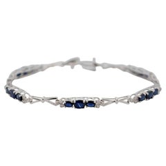 Bracciale in oro bianco 14K con diamanti e zaffiri_124023