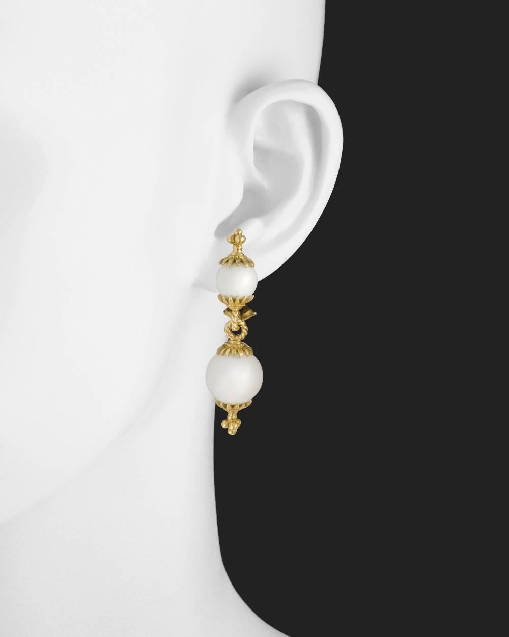 Double drop earrings, composed of round white coral beads, in hand-finished 18k yellow gold, signed Bielka. 2