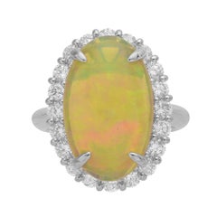 3.92 Carat Oval Opal and Diamond Halo Platinum Ring