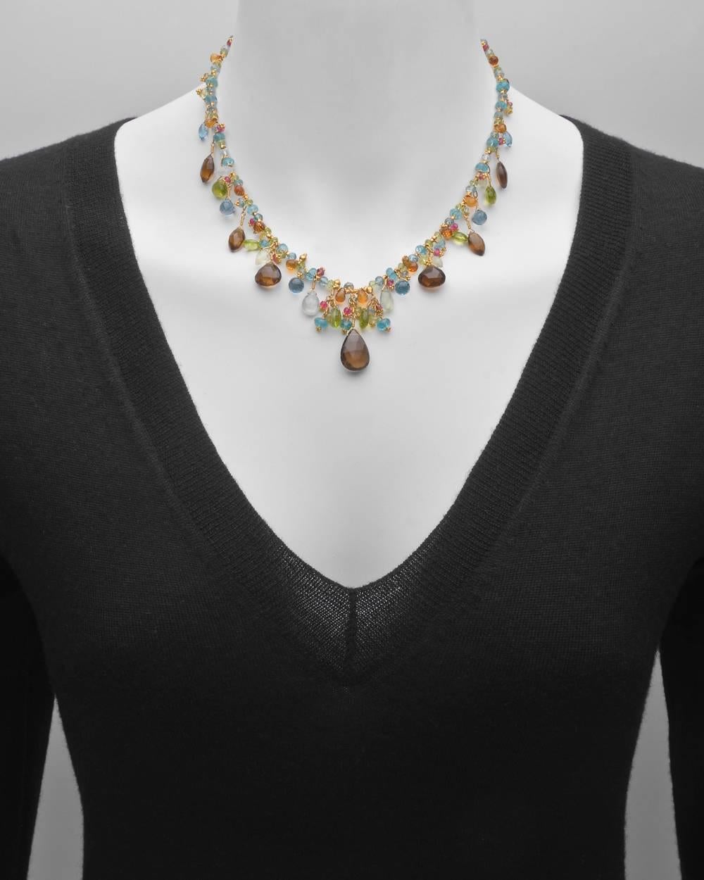 Multicolored gemstone beaded fringe necklace with whisky quartz, peridot, prehnite, blue topaz, apatite and citrine, as well as 22k yellow gold beads and cluster accents, with toggle clasp in 22k yellow gold, signed 