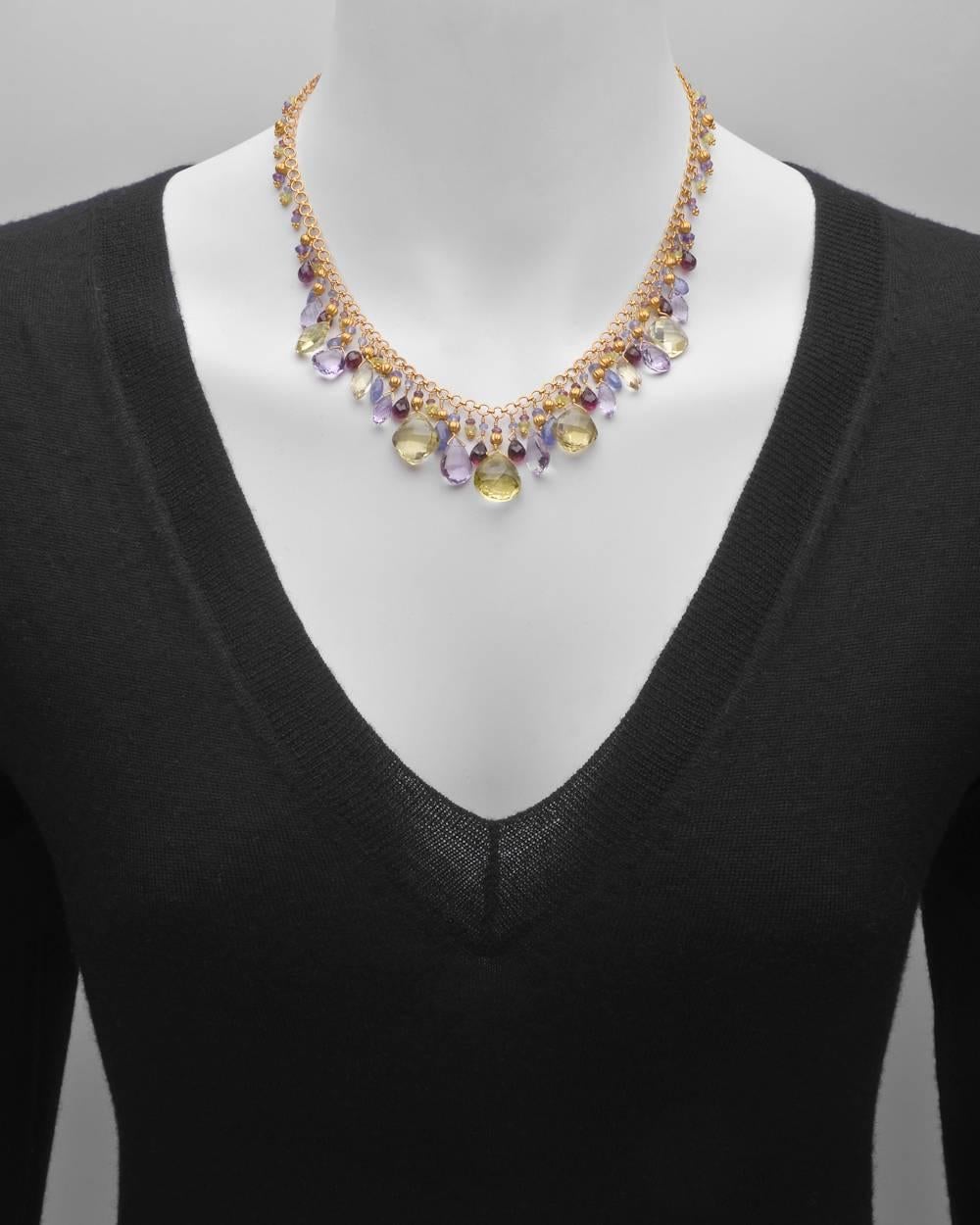 Multicolored gemstone bead necklace with lemon quartz, amethyst, rhodolite, tanzanite and chrysoberyl, on a 16.5