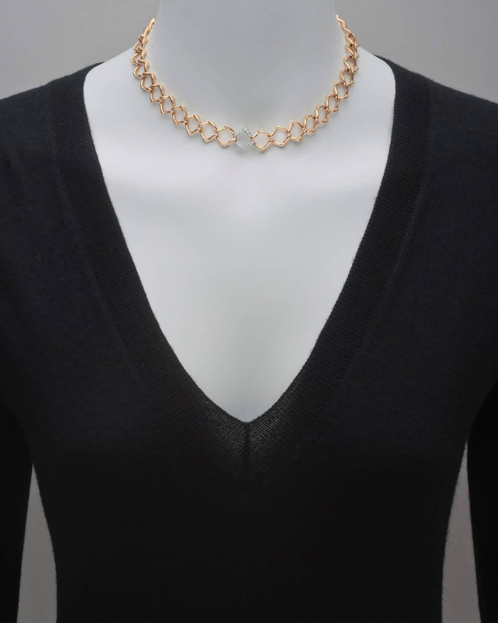 Open square-shaped link collar necklace in 18k pink gold, centering a single diamond-set link in platinum, secured by a box clasp, dated 1981, signed Paloma Picasso for Tiffany & Co. Twelve round diamonds weighing approximately 0.24 total carats