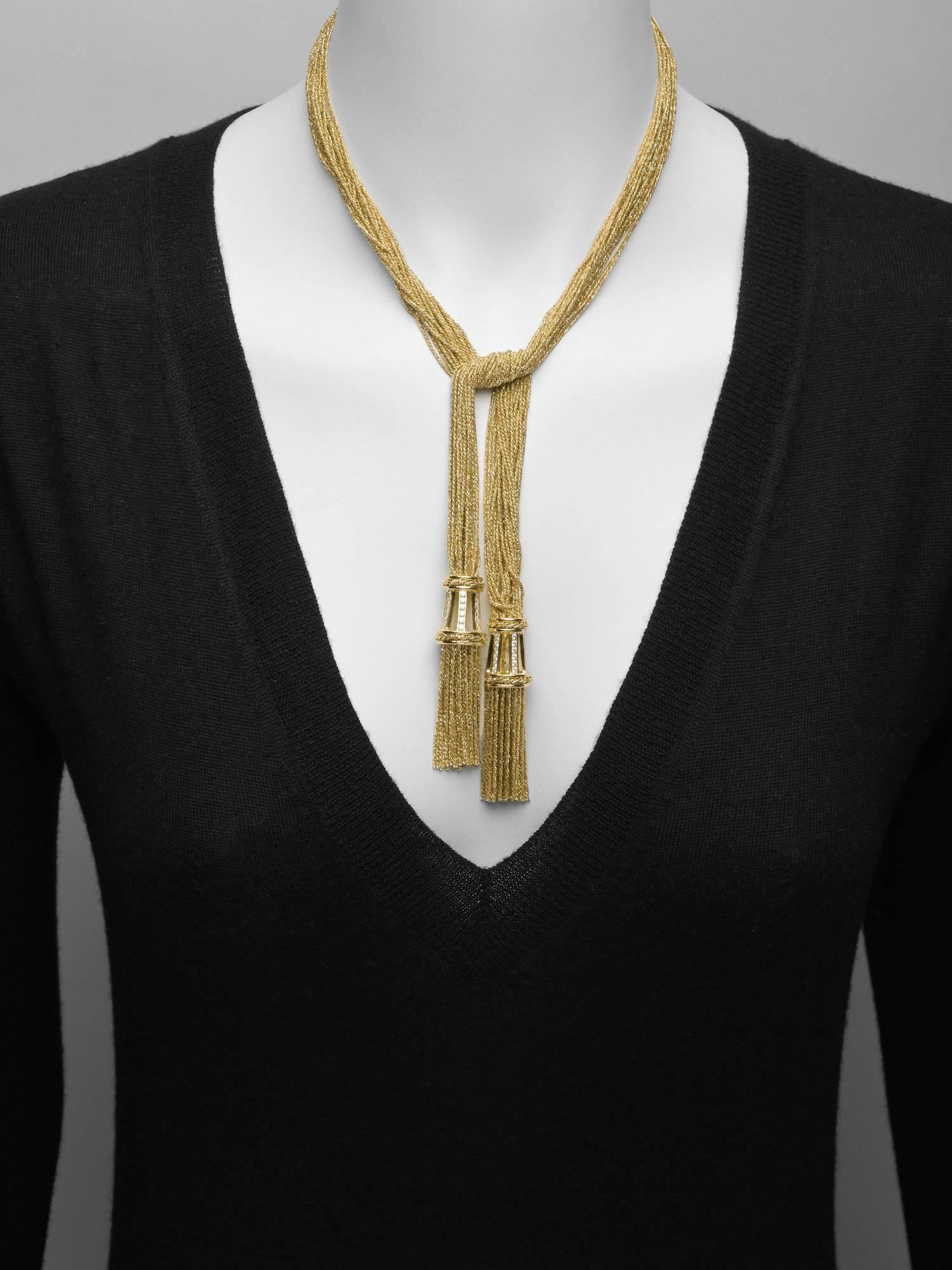 Lariat-style double tassel necklace, with twenty-one mesh strands in 18k yellow gold, either tassel pendant set with seventy-two round brilliant-cut diamonds weighing approximately 1.44 total carats (G-color, VVS-VS clarity), by Yuri Ichihashi.