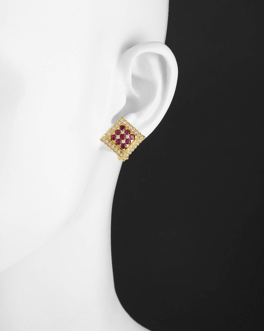 Square-shaped earclips, set with eighteen rubies weighing approximately 1.43 total carats and 56 diamonds weighing approximately 1.12 total carats, mounted in 18k yellow gold, with clip backs. 0.82