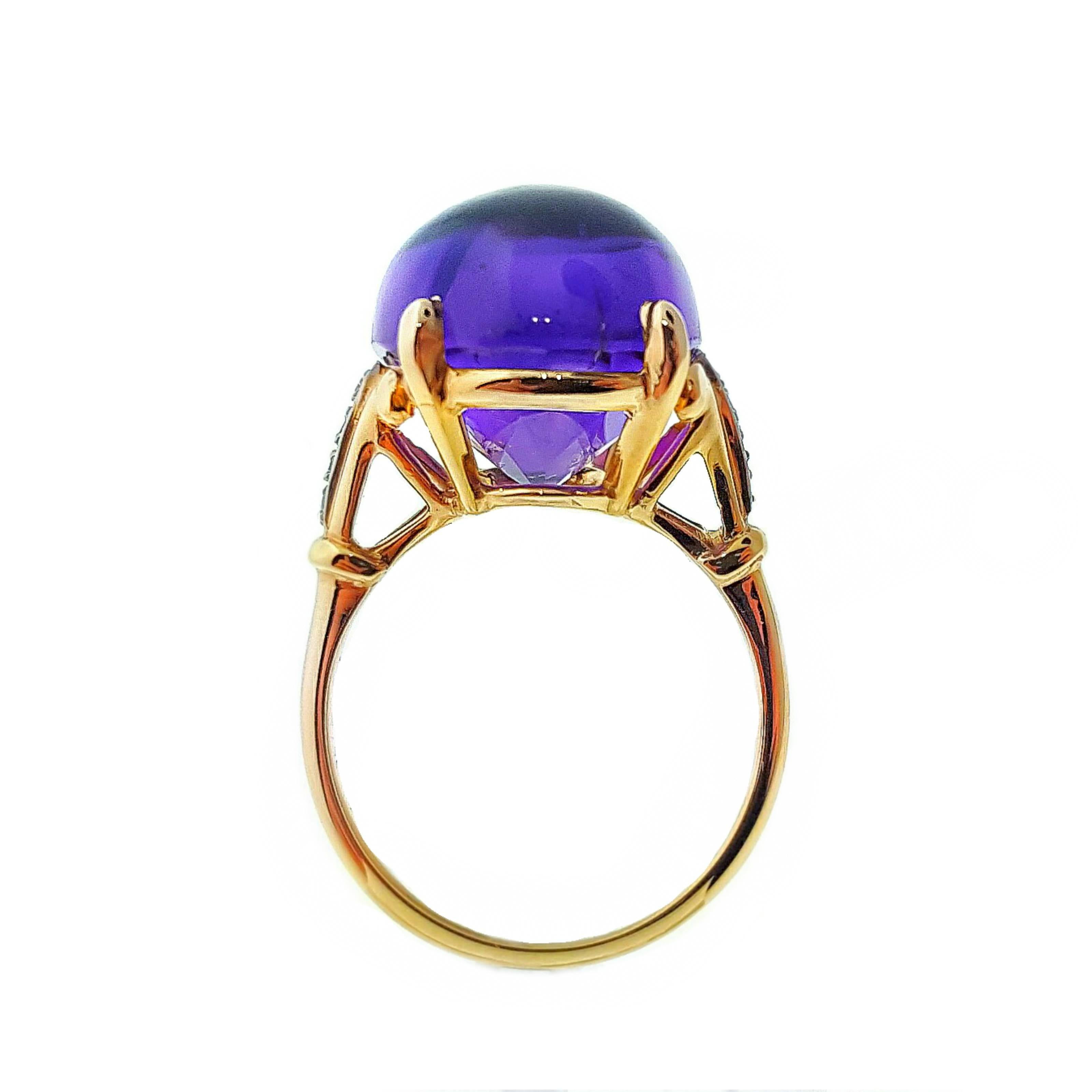 A dreamy 10.49ct cabochon amethyst sits at the center of this Art Deco Raymond Yard ring.  Accented with .10ctw of sparkling diamonds in high polished 14kt yellow gold. The ring is a US size 5.75 and measures approximately 16.5mm x 12.5mm at the top
