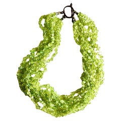 Peridot 8 strand necklace with patinated sterling silver hook and eye clasp