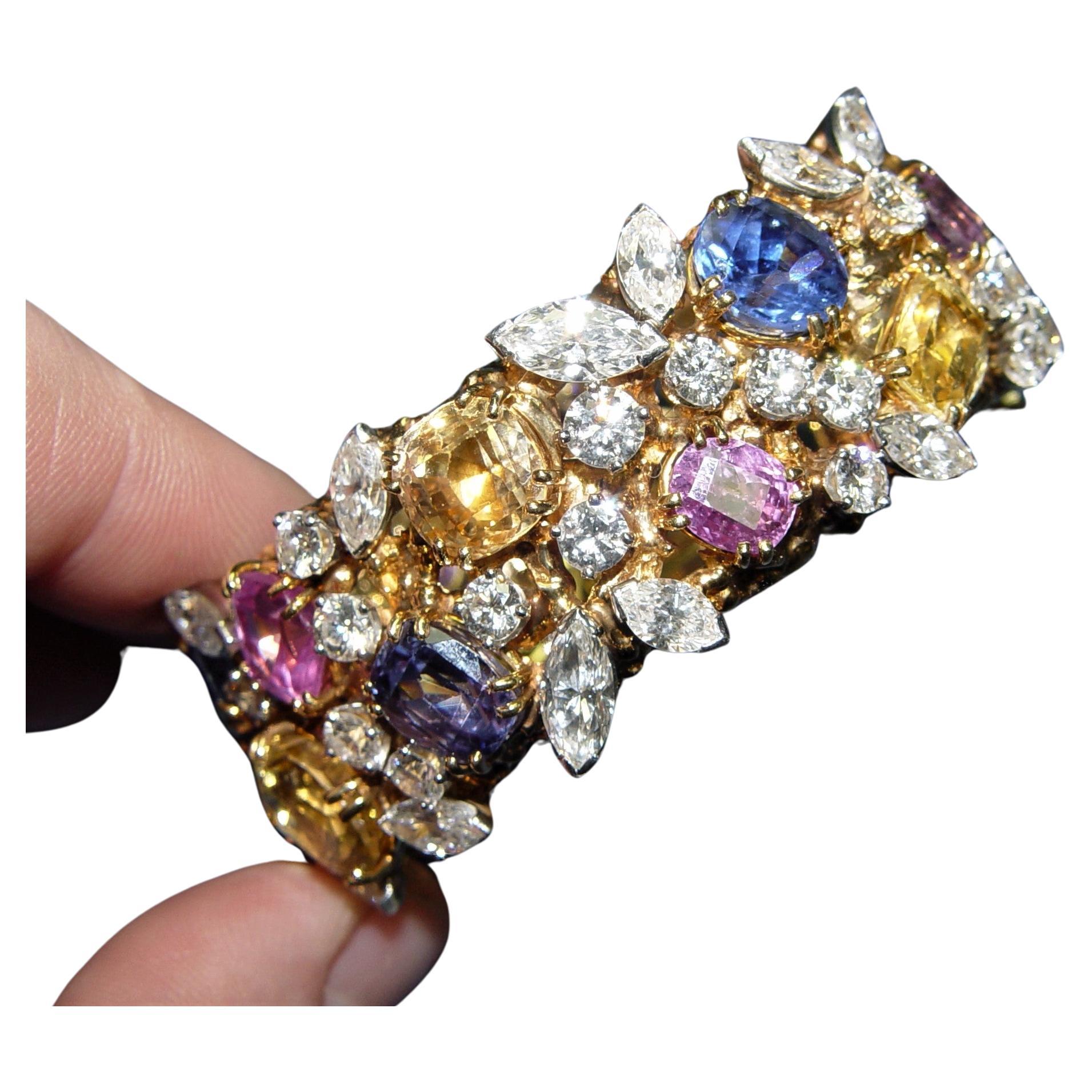 Bangle bracelet created by William Ruser around 1960's. Bracelet was evaluated by Christian Dunaigre AG, DUG with C. Dunaigre Consulting GmbH Switzerland. Please check gemstone report # CDC 1805401 for the details. Bracelet set with 90.00CT of 