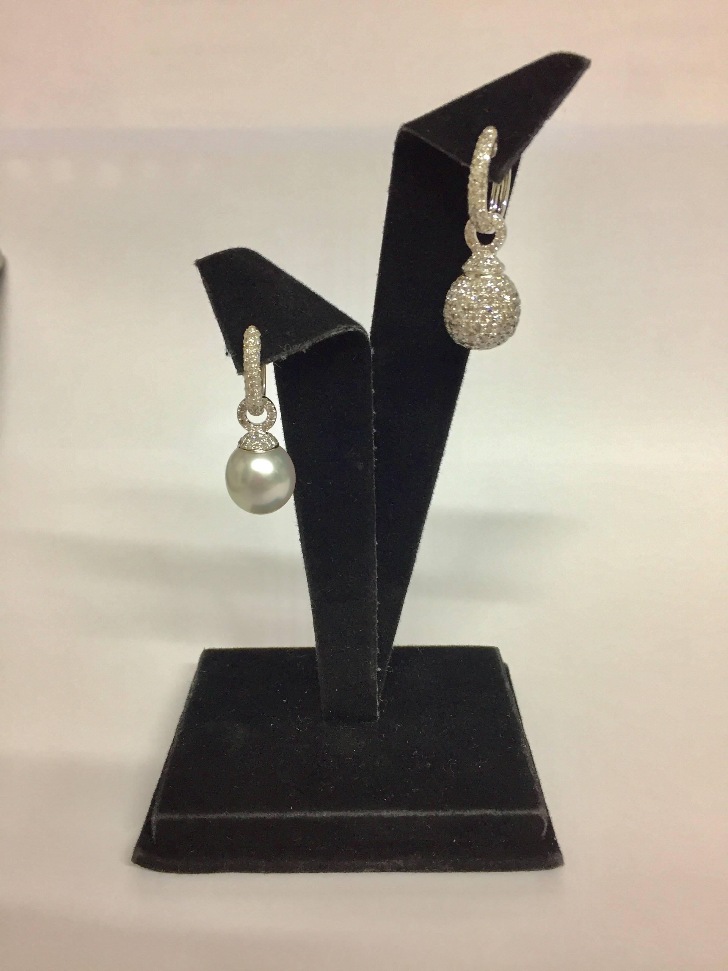 Earrings with 1 piece 13mm white south sea pearl and 315 pieces grey diamonds (3.59 carats). 18K white gold.