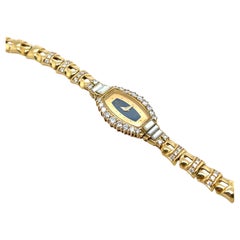Reloj Baume & Mercier de oro amarillo de 18 ct con diamantes - Raro reloj de época