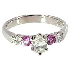 18 White Gold Diamond Ring, Set With Pink Sapphires
