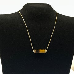 Collana vintage con catena in oro 18 carati e 1 pietra preziosa “occhio di tigre”
