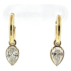 Boucles d'oreilles créoles en or jaune 14 carats serties de diamants taille poire – 0,85 carat