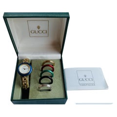 Vintage Gucci 11/12.2 Ladies Bangle Watch with Interchangeable Bezels Full Set