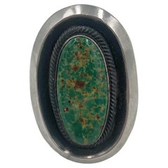 Turquoise ring with contemporary sterling silver setting 