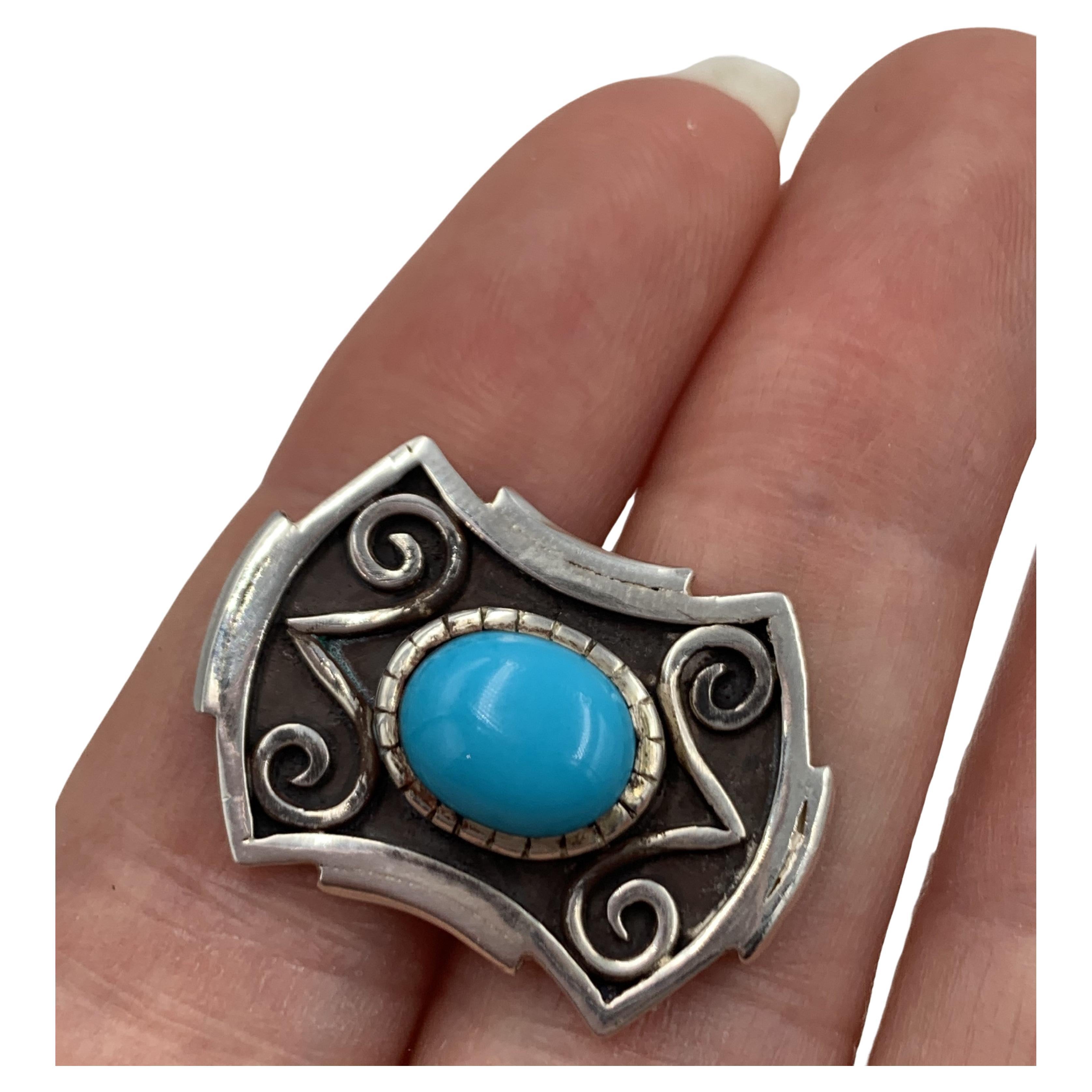Sterling silver cuff links made exclusively for Shades of the West by one of our Navajo silversmiths. The 1” x 3/4” cufflinks have a 1/4” x 1/2” Sleeping Beauty turquoise cabochon.

Signed “Shades of the West”

Located in Globe, AZ, the Sleeping