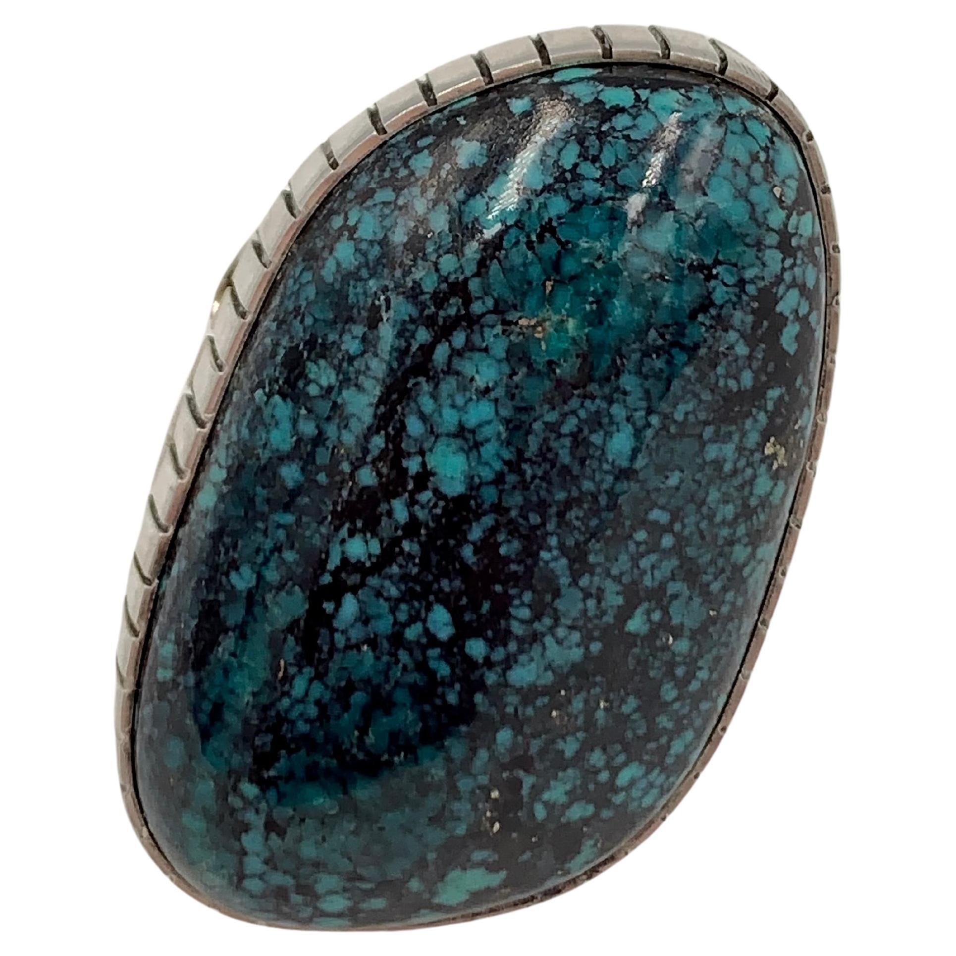 Old King’s Manassa Turquoise Sterling Silver Ring by Navajo Silversmith Alfred Lee.

Size: 8

The King's Manassa turquoise mine, or more accurately the 