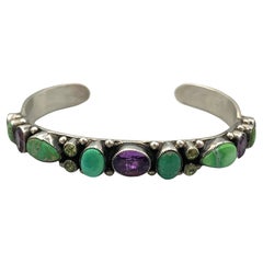 Bracciale in argento con pietre multiple di Leo Feeney