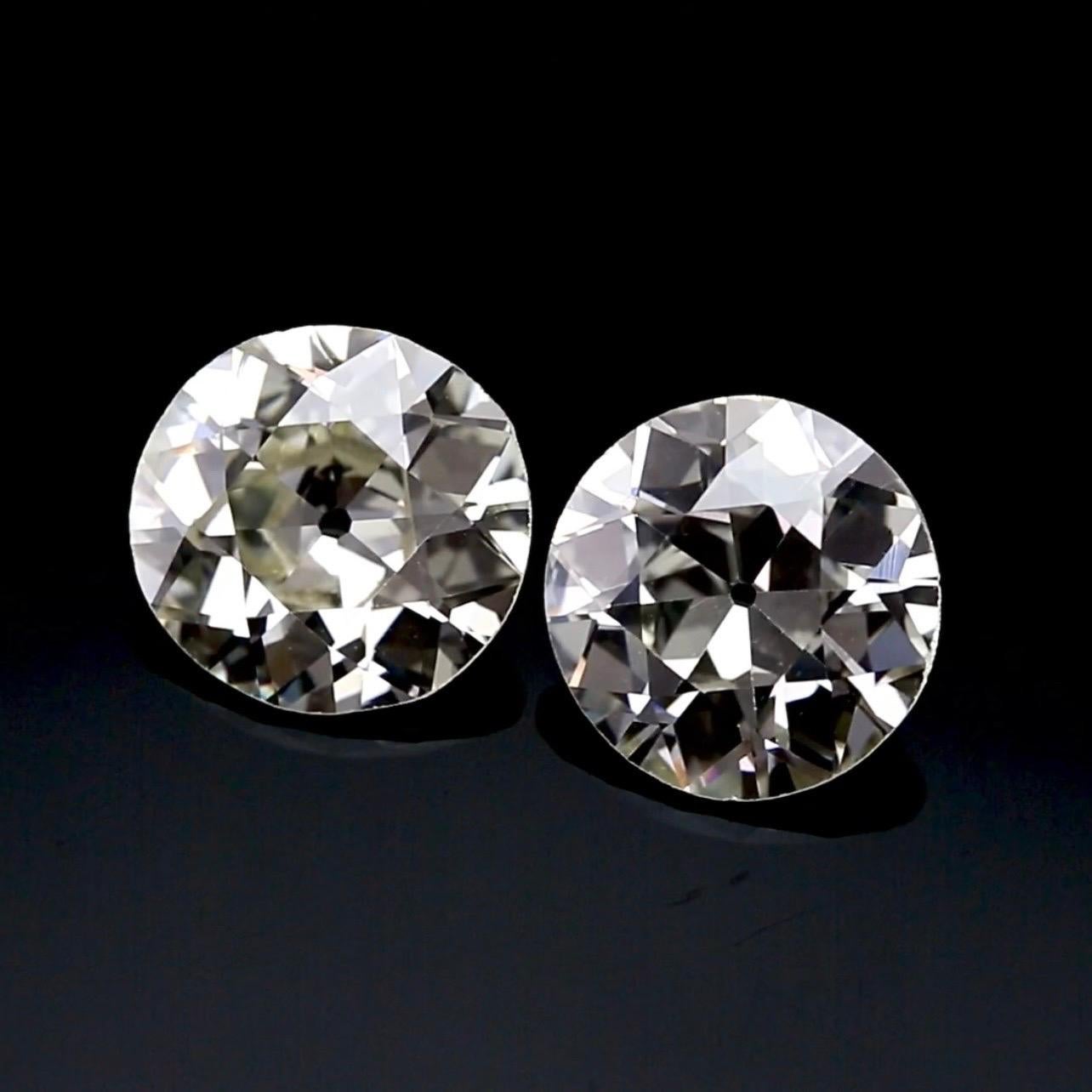 Old European Cut Diamonds , 6.58 Carats Total, GIA Cert - Rare Matching Pair In New Condition For Sale In Ramat Gan, IL