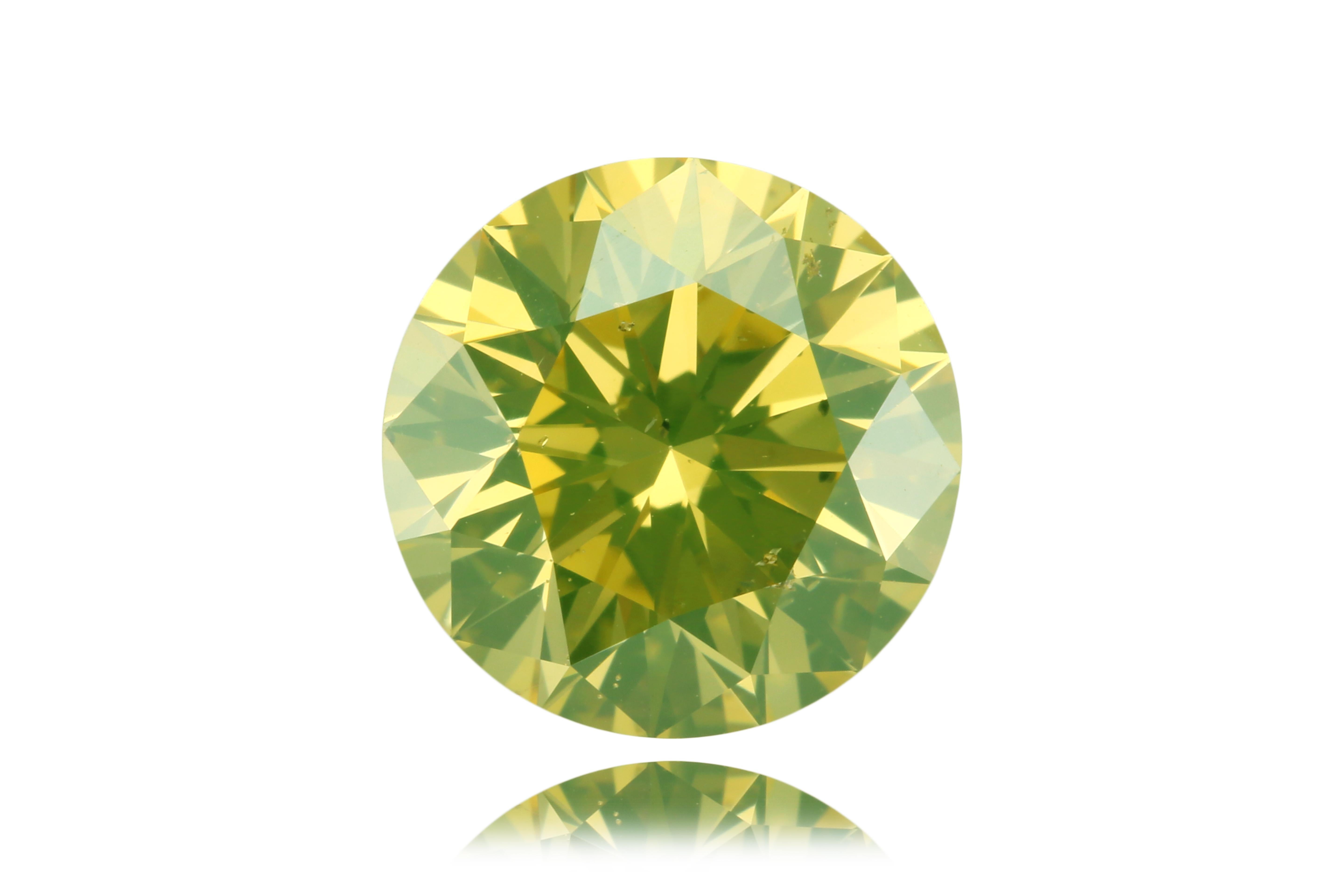 Diamant rond brillant de 2,22 carats de couleur vert-jaune intense - certifié par le GIA avec une rare fluorescence verte

Rareté exceptionnelle dans le monde des diamants naturels, ce diamant rond brillant de 2,22 carats de couleur vert intense et