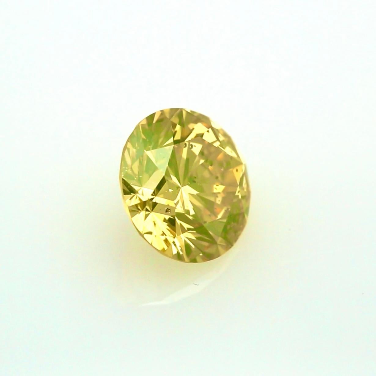 Diamant rond brillant de 2,22 carats de couleur vert-jaune intense - certifié GIA en vente 6
