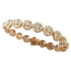 Bracelet tennis en or rose 18 carats avec halo de diamants ronds de 12,25 carats au total