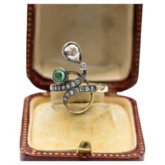 Art Nouveau ring with emerald and diamonds, circa 1900.