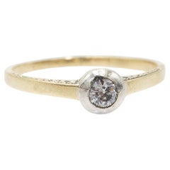 Old solitaire ring with a diamond in an old brilliant cut weighing 0.20 ct.