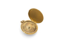 Antique gold pendant, locket with blue guilloché enamel and a rose-cut diamond