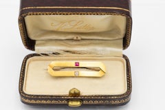 Old Art Deco 14k gold brooch with diamond and synthetic ruby, Austria-Hungary.