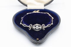 Antique gold and platinum bracelet with diamonds and synthetic sapphires.