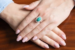 Platinum Ring with Turquoise and Diamonds 0.90 ct, Mid- 20th Century.