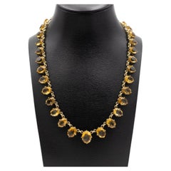 Old Rivière necklace with citrine, early 20th century.
