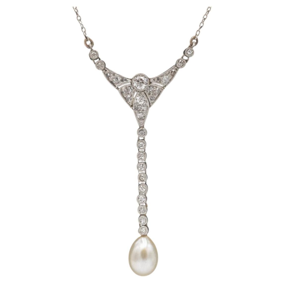 Antique platinum necklace with diamonds and pearl. For Sale