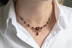 Old necklace with garnets and pearls, turn of the 19th and 20th centuries.