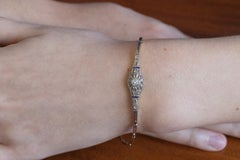 Gold bracelet with diamonds and synthetic sapphires in Art Deco style.