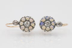 Charming gold and silver earrings with opals and old-cut diamonds, circa 1900.