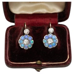 Charming gold and silver earrings with opals and old-cut diamonds, circa 1900.