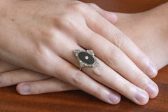 Unique Art Deco ring with onyx, diamonds, and pearls