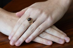 14k Gold signet ring with a cabochon-cut garnet, Austro-Hungarian 1872–1922.