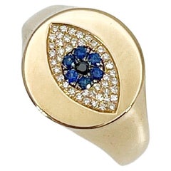 14K Yellow Gold .12 CTW Diamond and .08 CTW Sapphire Evil Eye Ring 