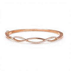 Bracciale rigido da donna con diamanti incastonati a pavé, in argento sterling 925.
