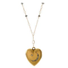 Heart Shaped Locket with Moon and Star Design